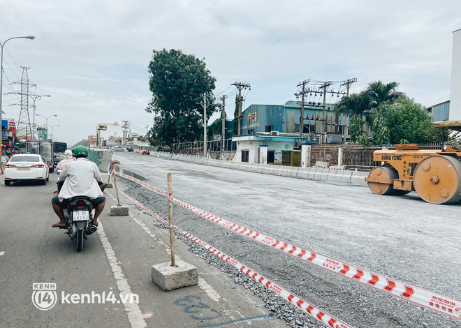 Công trình giao thông đầu tiên hoàn thành sau giãn cách xã hội ở Sài Gòn: Nhánh đầu tiên của cầu Bưng, trị giá hơn 500 tỉ đồng - Ảnh 10.