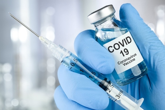 Vắc xin Covid-19 về Việt Nam trong tháng 2, ai sẽ được ưu tiên tiêm trước? - Ảnh 1.