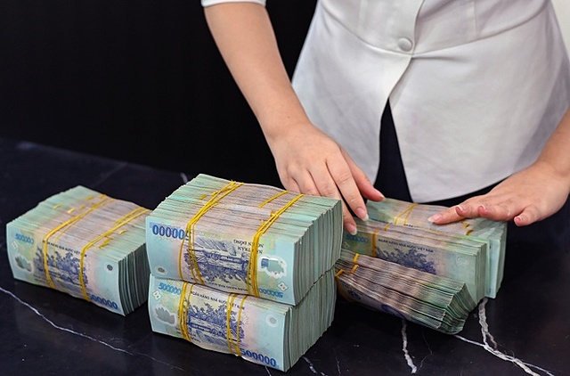 NHNN phản hồi đề xuất thay room tín dụng bằng quản lý hệ số an toàn vốn - Ảnh 1. NHNN phản hồi đề xuất thay room tín dụng bằng quản lý hệ số an toàn vốn - Ảnh 1.
