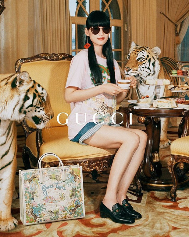 Thương hiệu xa xỉ Gucci gây tranh cãi vì dùng hổ thật quay quảng cáo - Ảnh 1.