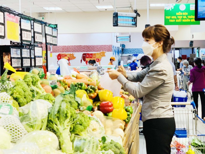 Bình ổn thị trường lớn mạnh qua nhiều thử thách - Ảnh 1. Bình ổn thị trường lớn mạnh qua nhiều thử thách - Ảnh 1.