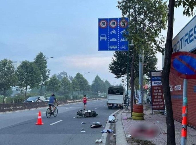 Cô gái trẻ tử vong trên vỉa hè đường Phạm Văn Đồng - Ảnh 1.