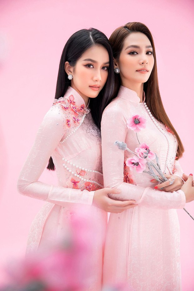 Á hậu Phương Anh đọ nhan sắc đỉnh cao với Hoa hậu Quốc tế 2019 trong tà áo dài Việt Nam - Ảnh 1.