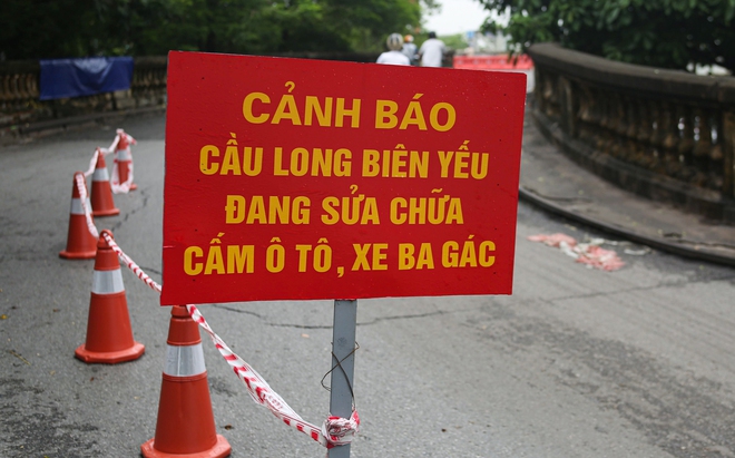  Hà Nội: Cầu Long Biên được lắp mắt thần, dựng rào chắn lối lên khiến xe ba gác chịu thua - Ảnh 9.