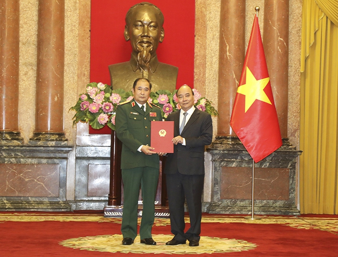 Chủ tịch nước Nguyễn Xuân Phúc trao quyết định thăng quân hàm Thượng tướng - Ảnh 1.