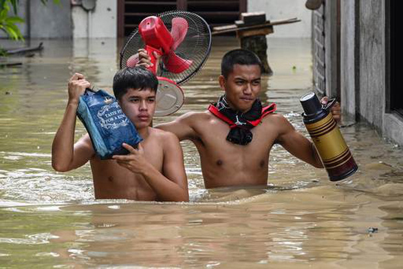 Philippines tan hoang sau khi siêu bão Noru tàn phá - Ảnh 2.