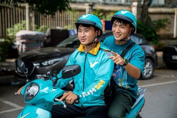 Cộng đồng tài xế SM Bike sau 2 tháng chạy ‘xe ôm điện’: ‘Khách nhiều, thu nhập ổn định’ - Ảnh 2.