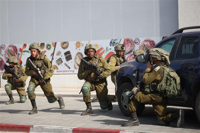 Toàn cảnh ngày đầu tiên leo thang xung đột giữa Israel và Hamas - Ảnh 6.