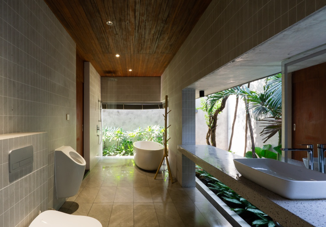 Phong cách nhiệt đới Á Đông kết hợp kiến trúc hiện đại trong căn biệt thự ven sông - Ảnh 11.