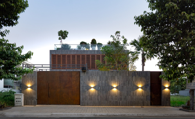 Phong cách nhiệt đới Á Đông kết hợp kiến trúc hiện đại trong căn biệt thự ven sông - Ảnh 2.