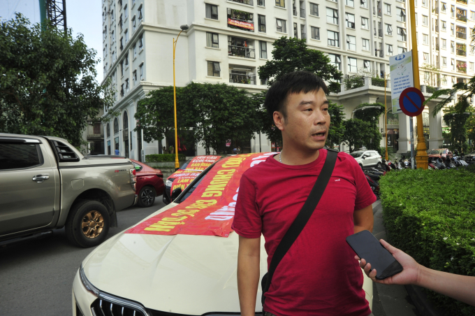 Hà Nội: Cư dân căng băng rôn, đỗ ô tô chặn cửa hầm phản đối vì chủ đầu tư không bàn giao quỹ bảo trì - Ảnh 6.