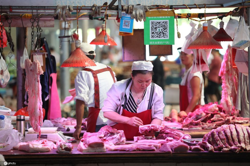 Trung Quốc lại chuẩn bị mua thịt heo dữ trữ để đẩy giá - Ảnh 1.