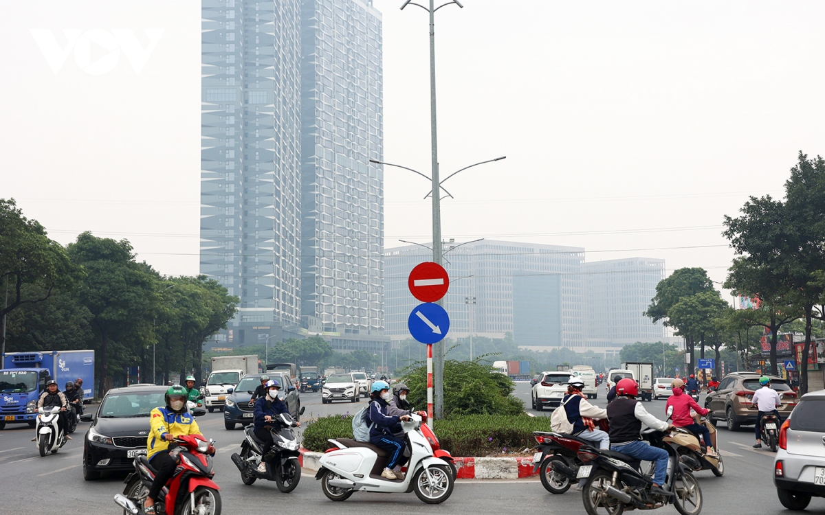 Nút giao không đèn đỏ đầu tiên ở Hà Nội sau 1 năm thí điểm - Ảnh 7.