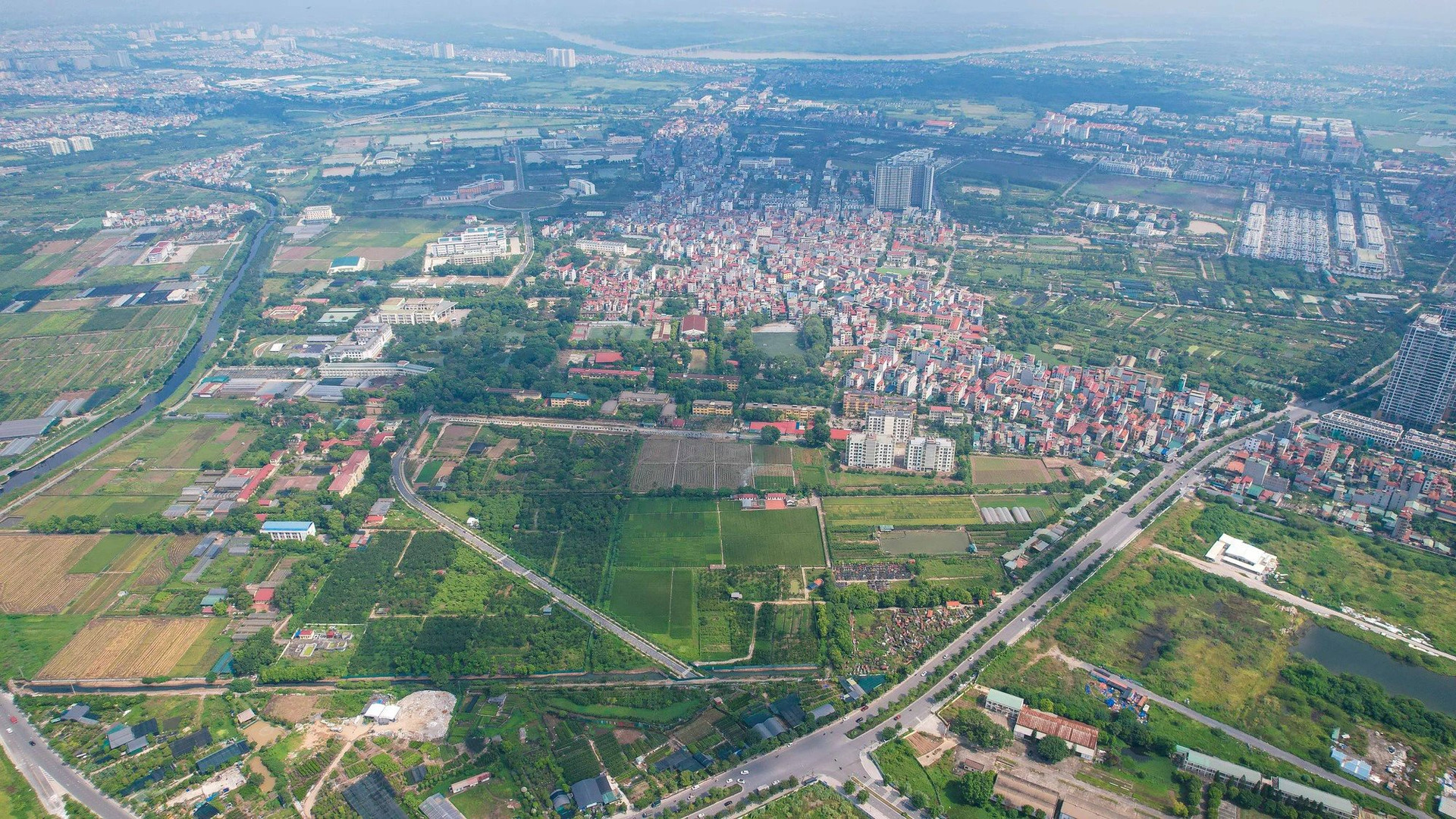 Huyện ngoại thành Hà Nội sắp lên quận, một phần được điều chỉnh thành đô thị trung tâm mới của Thủ đô - Ảnh 2.
