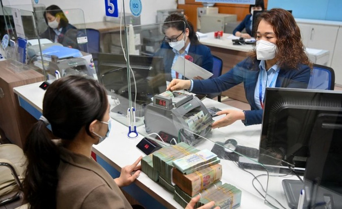 Ngân hàng giảm lãi suất cho vay, giảm giá vốn” cho doanh nghiệp - Ảnh 1. Ngân hàng giảm lãi suất cho vay, giảm giá vốn” cho doanh nghiệp - Ảnh 1.