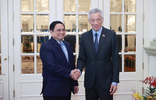Lễ đón Thủ tướng Phạm Minh Chính thăm chính thức Singapore - Ảnh 3.