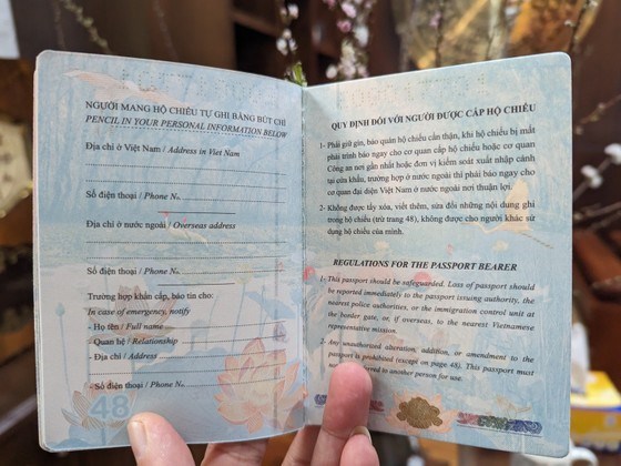 Cận cảnh mẫu hộ chiếu gắn chíp được cấp từ 1-3 - Ảnh 4.