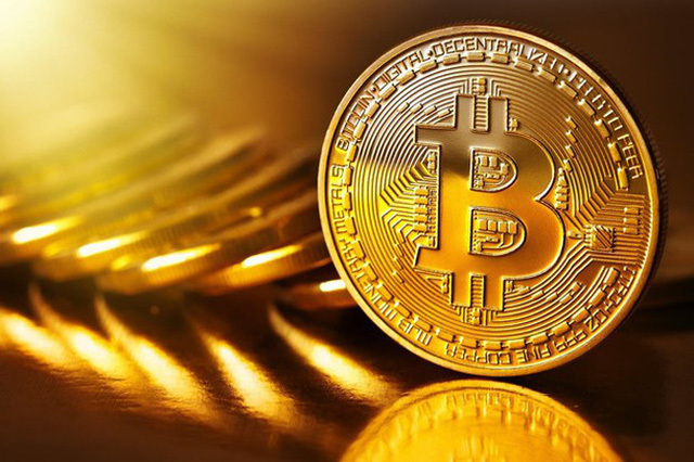 Giá Bitcoin bất ngờ tăng vọt - Ảnh 1.