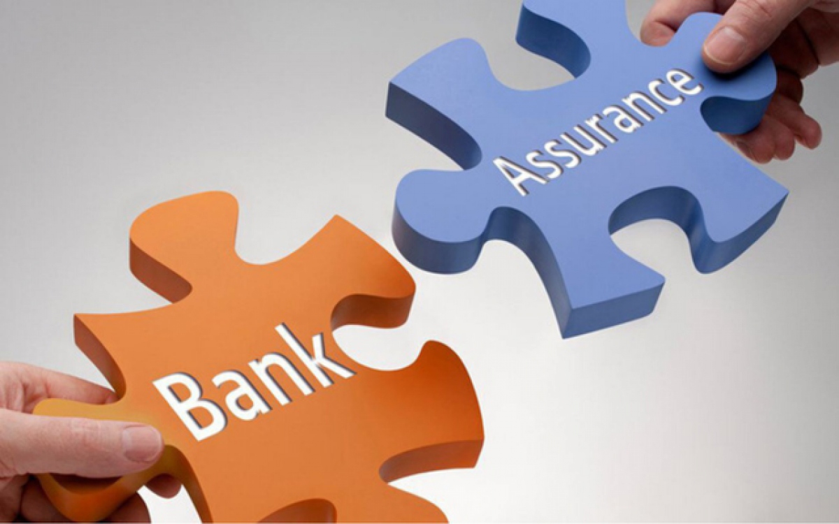 Bảo hiểm liên kết ngân hàng: Cần giải pháp mạnh đằng sau những “cái bắt tay” - Ảnh 1.