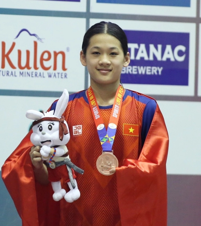 Thần đồng bơi lội 14 tuổi của Việt Nam tại SEA Games 32: Vượt qua kỷ lục của Ánh Viên, dậy sóng đường đua xanh - Ảnh 1.
