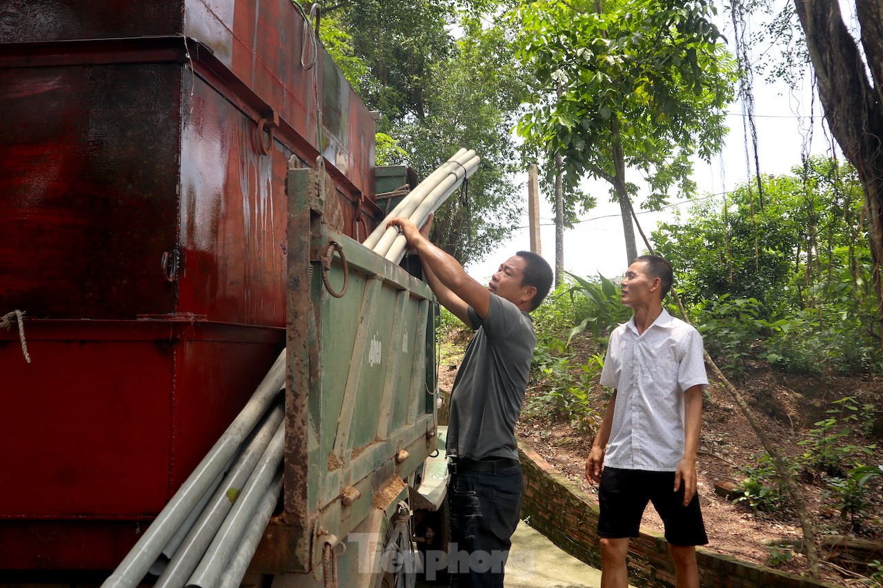 Hà Nội: Chật vật 'mang' nước giếng về làng dù sống giữa hai nhà máy nước lớn - Ảnh 4.