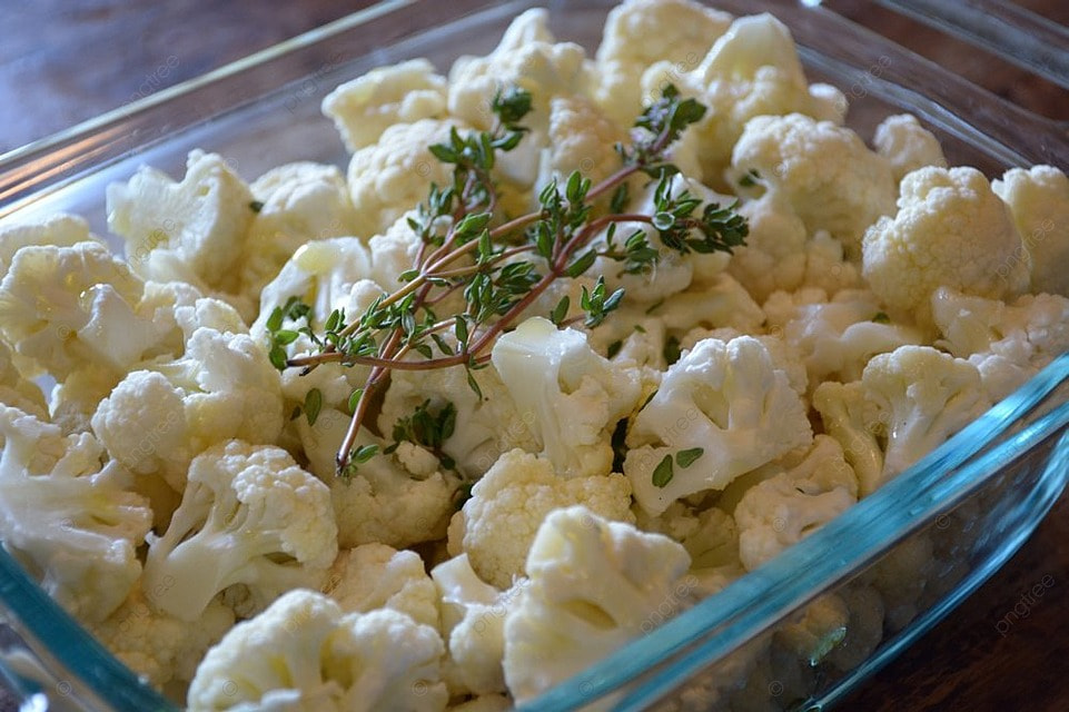pngtree-cauliflower-garnished-with-thyme-in-a-baking-dish-photo-image_3004643.jpeg
