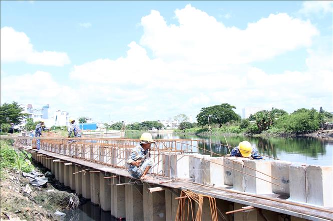 Nỗ lực thi công tại dự án kênh Tham Lương - Bến Cát - rạch Nước Lên - Ảnh 1.