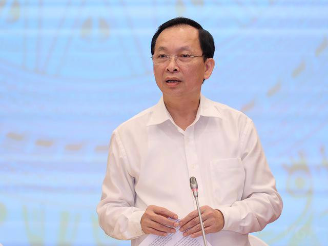 Phó Thống đốc Đào Minh Tú: Hệ thống ngân hàng đang phải &quot;chữa bệnh thừa tiền&quot; - Ảnh 1.