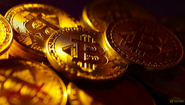 Mỹ chấp thuận ETF, giới đầu tư bitcoin vỡ oà - Ảnh 1.