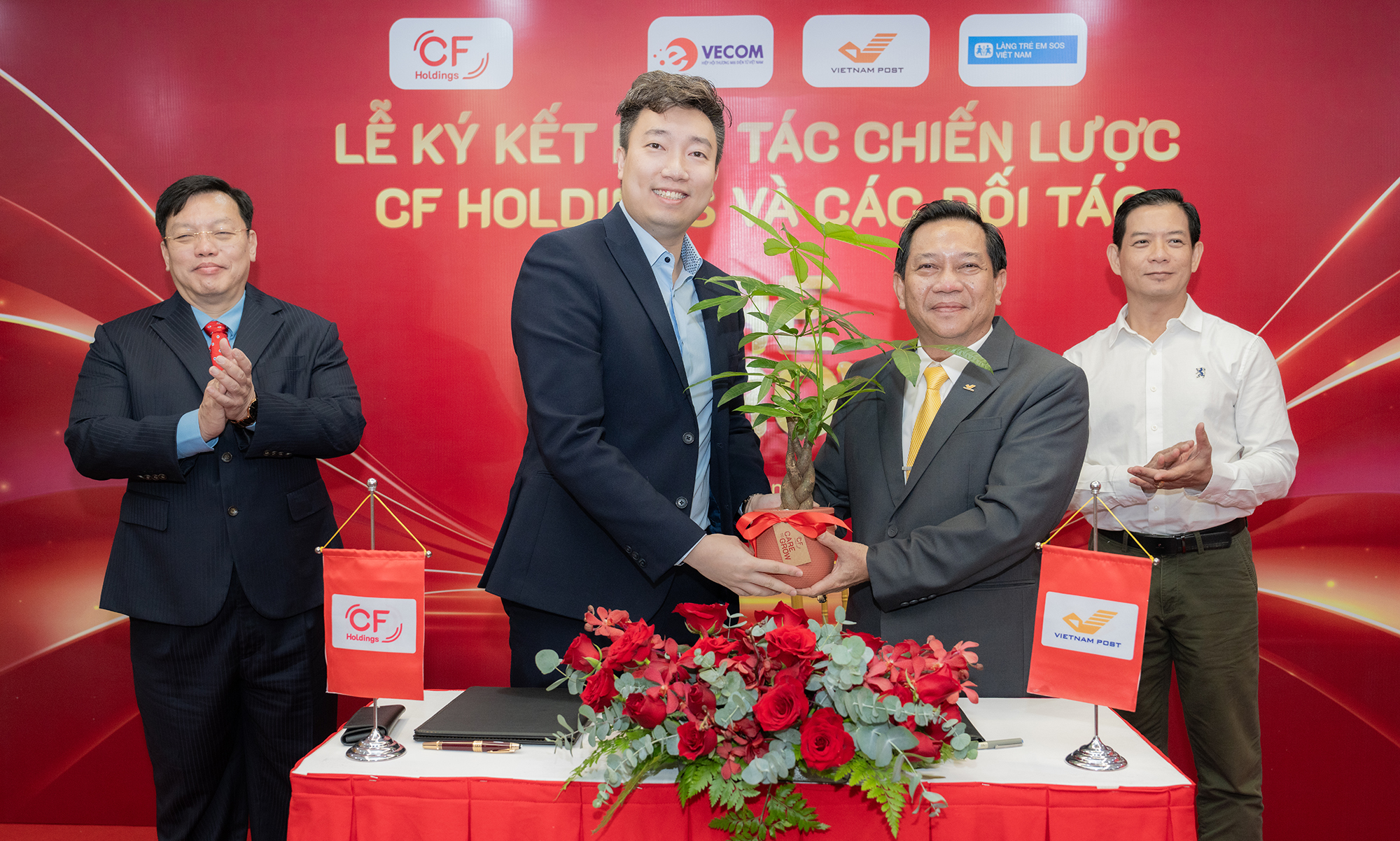 CF Holdings ký kết hợp tác chiến lược với VECOM, VNPost và Làng trẻ em SOS Việt Nam- Ảnh 2.