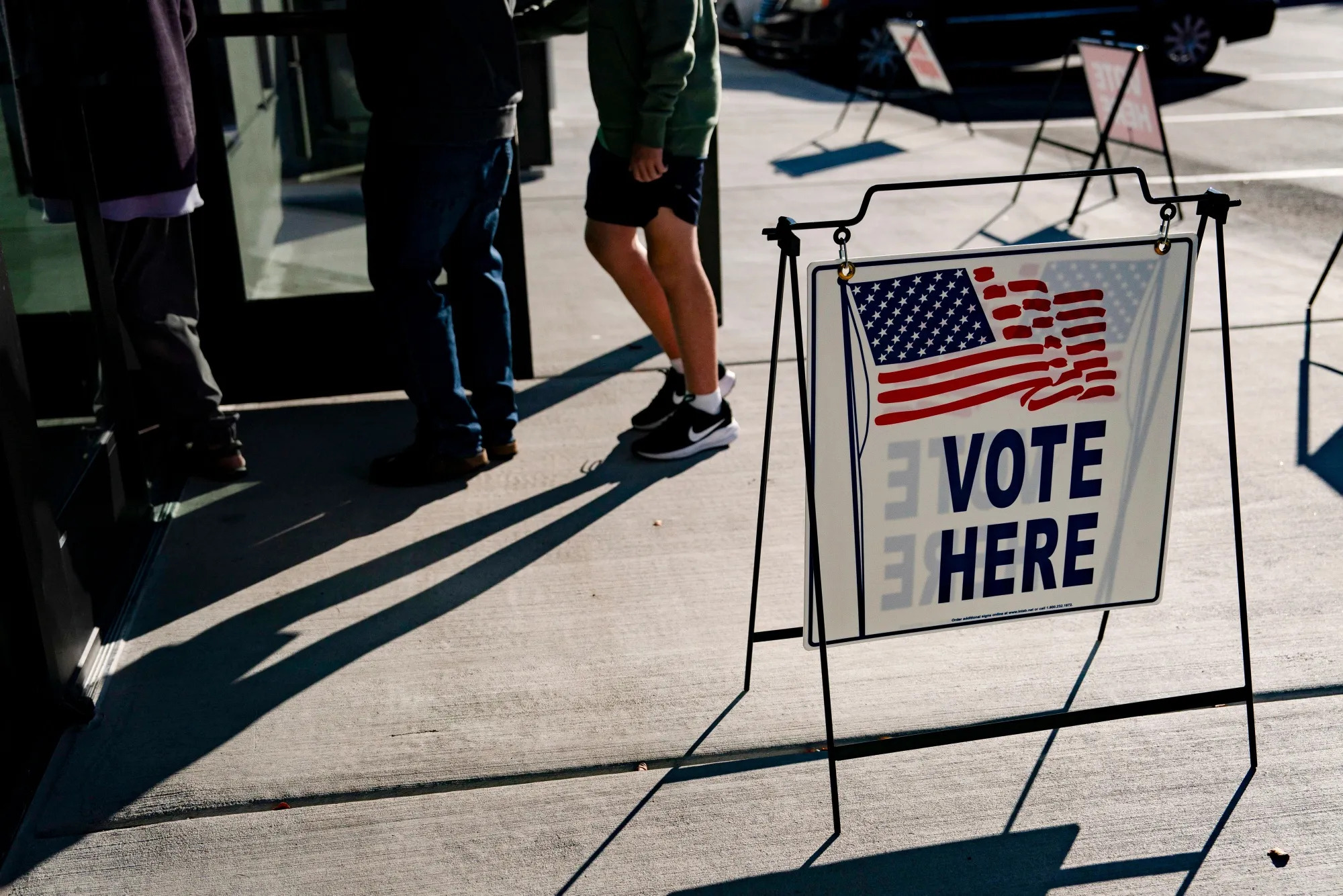 Voters wait in line to cast their ballots during the first day of early voting at a polling station in Wilmington, North Carolina, on  Oct. 17, 2024.Photographer: Allison Joyce/Bloomberg