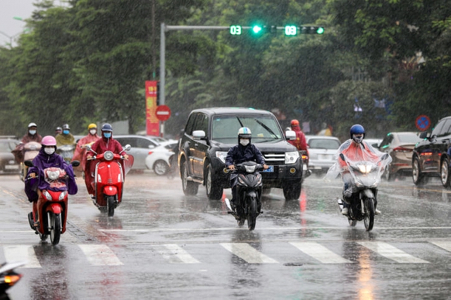 Ngày mai, nhiều nơi có mưa to- Ảnh 1.