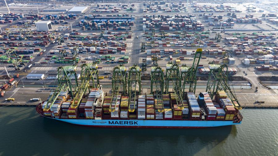 An aerial drone photo taken on Feb. 2, 2024 shows a container vessel berthing at a container terminal of Tianjin Port in north China's Tianjin. (Xinhua/Zhao Zishuo)