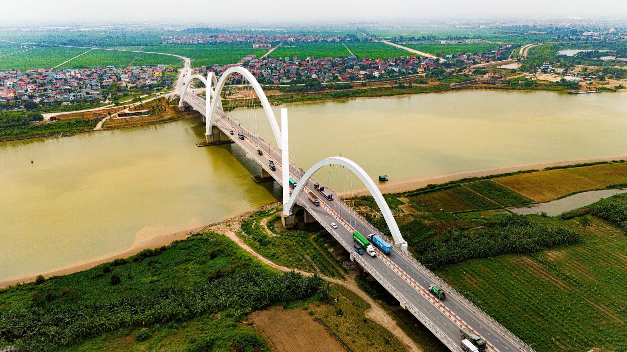 Cần cẩu siêu trọng đi suốt một tháng để dựng nên cầu 1.900 tỷ, có vòm thép cao nhất Việt Nam- Ảnh 5.