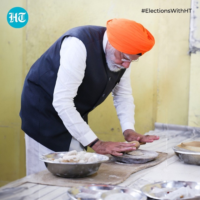 Thủ tướng Ấn Độ đích thân phục vụ bữa ăn cho người dân- Ảnh 2.