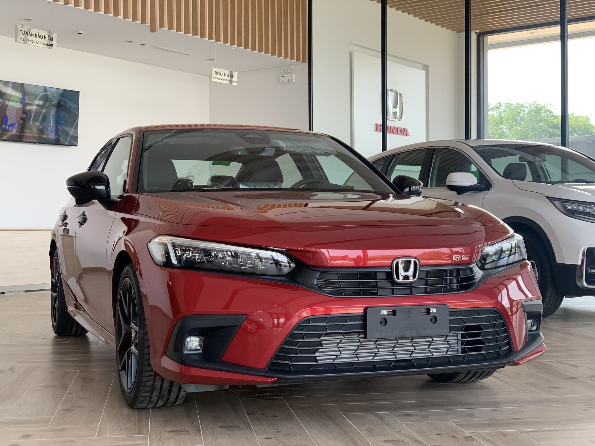Đại lý báo Honda Civic 2024 sắp về Việt Nam: Thêm động cơ hybrid, giá dự kiến đắt hơn, bản cũ đã dọn kho hết hàng- Ảnh 1.