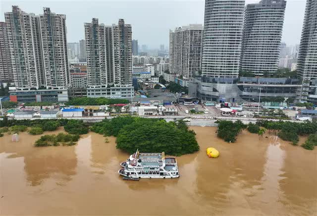 Nhiều khu vực tại Trung Quốc, Nhật Bản, Hàn Quốc "oằn mình" chống lũ lụt- Ảnh 3.