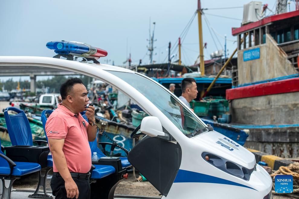 China upgrades emergency response for typhoon Yagi in Guangdong, Hainan to level II Source: XinhuaEditor: huaxia2024-09-05 20:11:30       Workers cut redundant branches of trees ahead of the landfall of typhoon Yagi in Haikou, south China's Hainan Province, Sept. 5, 2024. The State Flood Control and Drought Relief Headquarters raised its emergency response for flood and typhoon prevention from level III to level II in Guangdong and Hainan provinces at 3 p.m. Thursday, as typhoon Yagi approaches. Yagi is expected to make landfall on Friday afternoon or evening somewhere between the city of Qionghai in Hainan and Maoming City in Guangdong. (Xinhua/Guo Cheng)  BEIJING, Sept. 5 (Xinhua) -- The State Flood Control and Drought Relief Headquarters raised its emergency response for flood and typhoon prevention from level III to level II in the Guangdong and Hainan provinces at 3 p.m. Thursday, as Typhoon Yagi approaches.  The eye of Yagi, the 11th typhoon of the year, was located on the sea approximately 540 km southeast of Xuwen County, Guangdong Province, at 2 p.m. Thursday.  Yagi is expected to make landfall on Friday afternoon or evening somewhere between the city of Qionghai in Hainan and Maoming City in Guangdong.  Due to the approaching typhoon, the main section of the Hong Kong-Zhuhai-Macao Bridge will be closed temporarily from 9 p.m. Thursday, according to the bridge's emergency rescue headquarters.  Affected by Yagi, parts of Guangdong and Hainan will be pounded by rainstorms from Thursday to Sunday, with daily rainfall likely to reach around 500 mm or more. All childcare institutions, kindergartens, primary and secondary schools, and secondary vocational schools in Guangdong's Zhuhai City have been asked to suspend classes, local authorities have said.  China has a four-tier flood-control emergency-response system, with Level I being the most severe response. ■    A staff member reinforces a glass window in Haikou, south China's Hainan Province, Sept. 5, 2024. The State Flood Control and Drought Relief Headquarters raised its emergency response for flood and typhoon prevention from level III to level II in Guangdong and Hainan provinces at 3 p.m. Thursday, as typhoon Yagi approaches.  Yagi is expected to make landfall on Friday afternoon or evening somewhere between the city of Qionghai in Hainan and Maoming City in Guangdong. (Xinhua/Guo Cheng)    Workers cut redundant branches of trees ahead of the landfall of typhoon Yagi in Haikou, south China's Hainan Province, Sept. 5, 2024. The State Flood Control and Drought Relief Headquarters raised its emergency response for flood and typhoon prevention from level III to level II in Guangdong and Hainan provinces at 3 p.m. Thursday, as typhoon Yagi approaches.  Yagi is expected to make landfall on Friday afternoon or evening somewhere between the city of Qionghai in Hainan and Maoming City in Guangdong. (Xinhua/Guo Cheng)    The closed Dadonghai scenic area is seen in Sanya, south China's Hainan Province, Sept. 5, 2024. The State Flood Control and Drought Relief Headquarters raised its emergency response for flood and typhoon prevention from level III to level II in Guangdong and Hainan provinces at 3 p.m. Thursday, as typhoon Yagi approaches.  Yagi is expected to make landfall on Friday afternoon or evening somewhere between the city of Qionghai in Hainan and Maoming City in Guangdong. (Xinhua/Zhao Yingquan)    The closed Dadonghai scenic area is seen in Sanya, south China's Hainan Province, Sept. 5, 2024. The State Flood Control and Drought Relief Headquarters raised its emergency response for flood and typhoon prevention from level III to level II in Guangdong and Hainan provinces at 3 p.m. Thursday, as typhoon Yagi approaches.  Yagi is expected to make landfall on Friday afternoon or evening somewhere between the city of Qionghai in Hainan and Maoming City in Guangdong. (Xinhua/Zhao Yingquan)    An employee arranges a sandbag barrier ahead of the landfall of typhoon Yagi in Haikou, south China's Hainan Province, Sept. 5, 2024. The State Flood Control and Drought Relief Headquarters raised its emergency response for flood and typhoon prevention from level III to level II in Guangdong and Hainan provinces at 3 p.m. Thursday, as typhoon Yagi approaches.  Yagi is expected to make landfall on Friday afternoon or evening somewhere between the city of Qionghai in Hainan and Maoming City in Guangdong. (Xinhua/Guo Cheng)    A construction site is seen in Haikou, south China's Hainan Province, Sept. 5, 2024. The State Flood Control and Drought Relief Headquarters raised its emergency response for flood and typhoon prevention from level III to level II in Guangdong and Hainan provinces at 3 p.m. Thursday, as typhoon Yagi approaches.  Yagi is expected to make landfall on Friday afternoon or evening somewhere between the city of Qionghai in Hainan and Maoming City in Guangdong. (Xinhua/Pu Xiaoxu)    The Qilou old street is seen in Haikou, south China's Hainan Province, Sept. 5, 2024. The State Flood Control and Drought Relief Headquarters raised its emergency response for flood and typhoon prevention from level III to level II in Guangdong and Hainan provinces at 3 p.m. Thursday, as typhoon Yagi approaches.  Yagi is expected to make landfall on Friday afternoon or evening somewhere between the city of Qionghai in Hainan and Maoming City in Guangdong. (Xinhua/Pu Xiaoxu)    An aerial drone photo taken on Sept. 5, 2024 shows fishing ships docking at Tanmen port in Qionghai, south China's Hainan Province. The State Flood Control and Drought Relief Headquarters raised its emergency response for flood and typhoon prevention from level III to level II in Guangdong and Hainan provinces at 3 p.m. Thursday, as typhoon Yagi approaches.  Yagi is expected to make landfall on Friday afternoon or evening somewhere between the city of Qionghai in Hainan and Maoming City in Guangdong. (Photo by Meng Zhongde/Xinhua)    The closed Xiuying Port is seen in Haikou, south China's Hainan Province, Sept. 5, 2024. The State Flood Control and Drought Relief Headquarters raised its emergency response for flood and typhoon prevention from level III to level II in Guangdong and Hainan provinces at 3 p.m. Thursday, as typhoon Yagi approaches.  Yagi is expected to make landfall on Friday afternoon or evening somewhere between the city of Qionghai in Hainan and Maoming City in Guangdong. (Xinhua/Pu Xiaoxu)    A fisherman fastens a fishing boat in Boao township of Qionghai, south China's Hainan Province, Sept. 5, 2024. The State Flood Control and Drought Relief Headquarters raised its emergency response for flood and typhoon prevention from level III to level II in Guangdong and Hainan provinces at 3 p.m. Thursday, as typhoon Yagi approaches.  Yagi is expected to make landfall on Friday afternoon or evening somewhere between the city of Qionghai in Hainan and Maoming City in Guangdong. (Photo by Meng Zhongde/Xinhua)    A staff member makes an emergency call to remind the fishermen to make preparations for the typhoon in Tanmen township of Qionghai, south China's Hainan Province, Sept. 5, 2024. The State Flood Control and Drought Relief Headquarters raised its emergency response for flood and typhoon prevention from level III to level II in Guangdong and Hainan provinces at 3 p.m. Thursday, as typhoon Yagi approaches.  Yagi is expected to make landfall on Friday afternoon or evening somewhere between the city of Qionghai in Hainan and Maoming City in Guangdong. (Photo by Meng Zhongde/Xinhua)