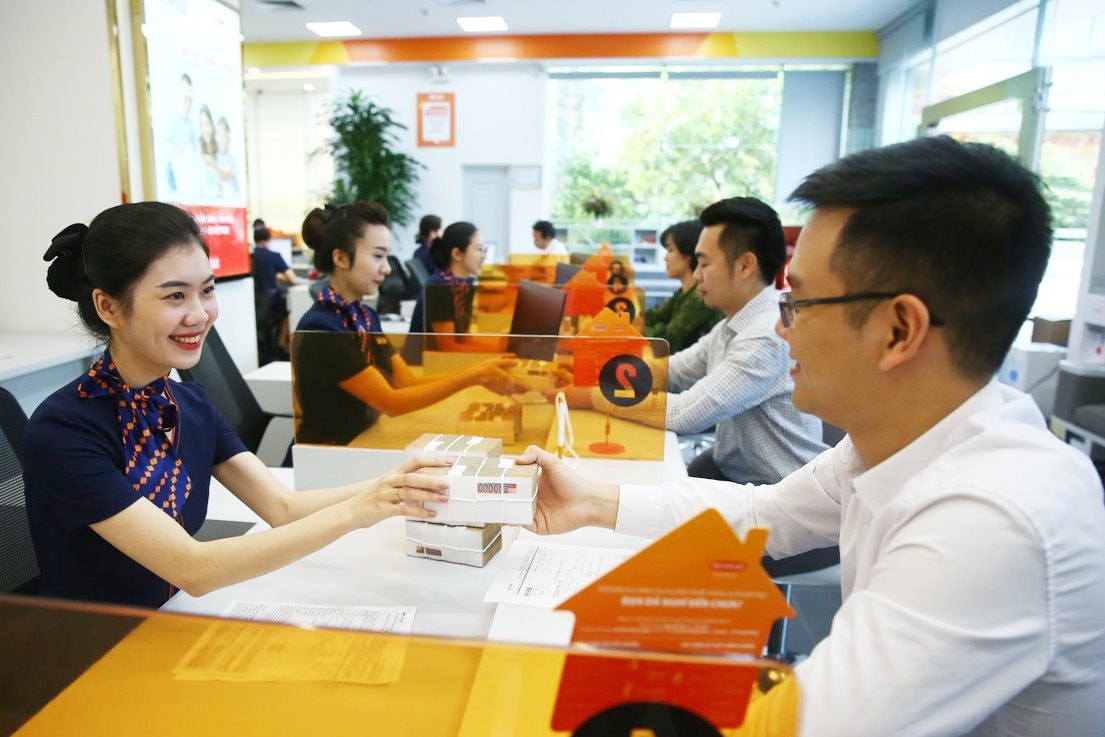 Lãi suất cho vay và nợ xấu được dự báo tiếp tục giảm- Ảnh 1.
