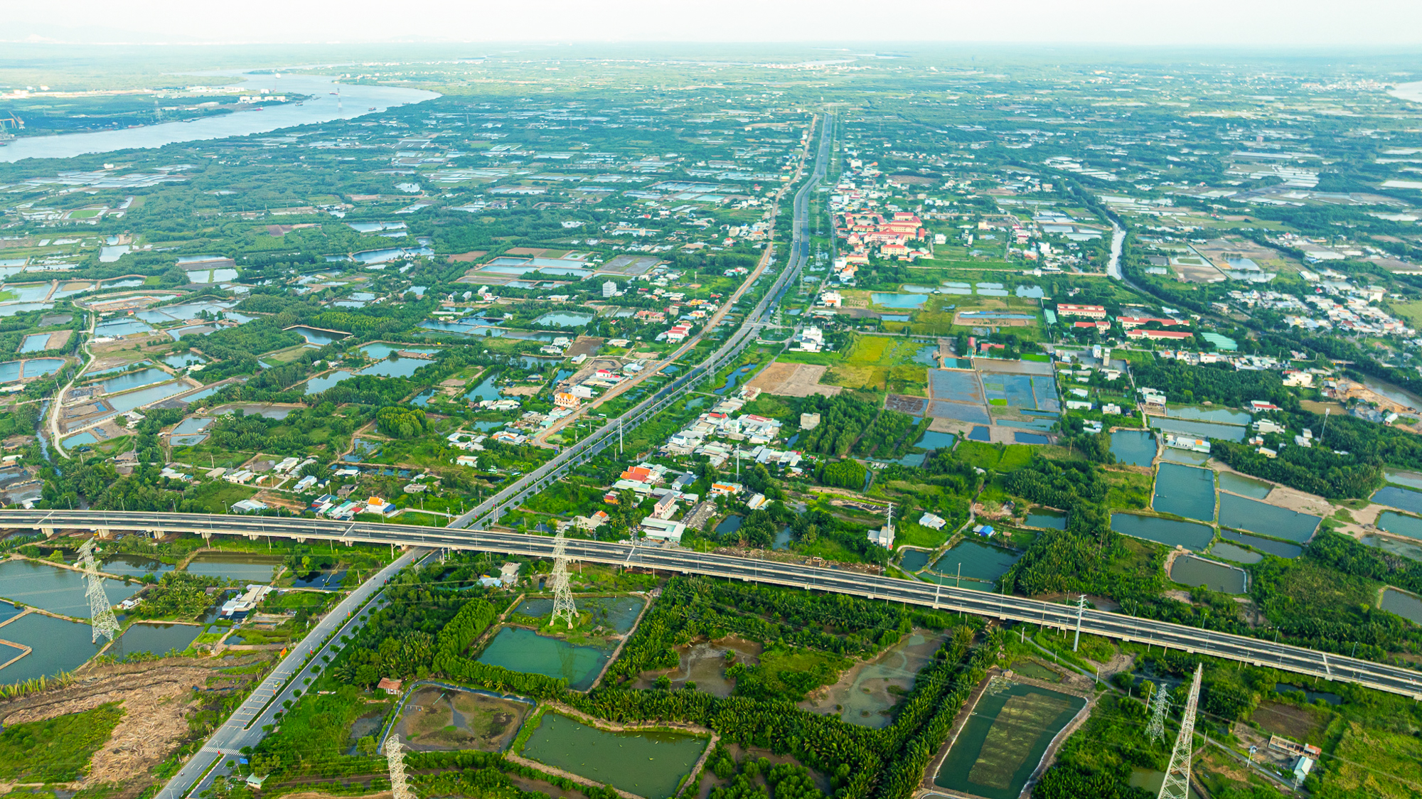 Toàn cảnh khu vực sẽ làm nút giao 3.000 tỷ, lần đầu phá thế qua sông lụy phà của lá phổi xanh ở TP.HCM- Ảnh 1. Toàn cảnh khu vực sẽ làm nút giao 3.000 tỷ, lần đầu phá thế qua sông lụy phà của lá phổi xanh ở TP.HCM- Ảnh 1.
