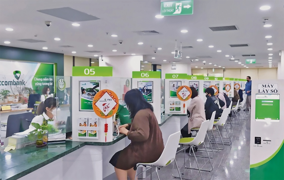 Lãi suất đang chịu nhiều sức ép- Ảnh 1.