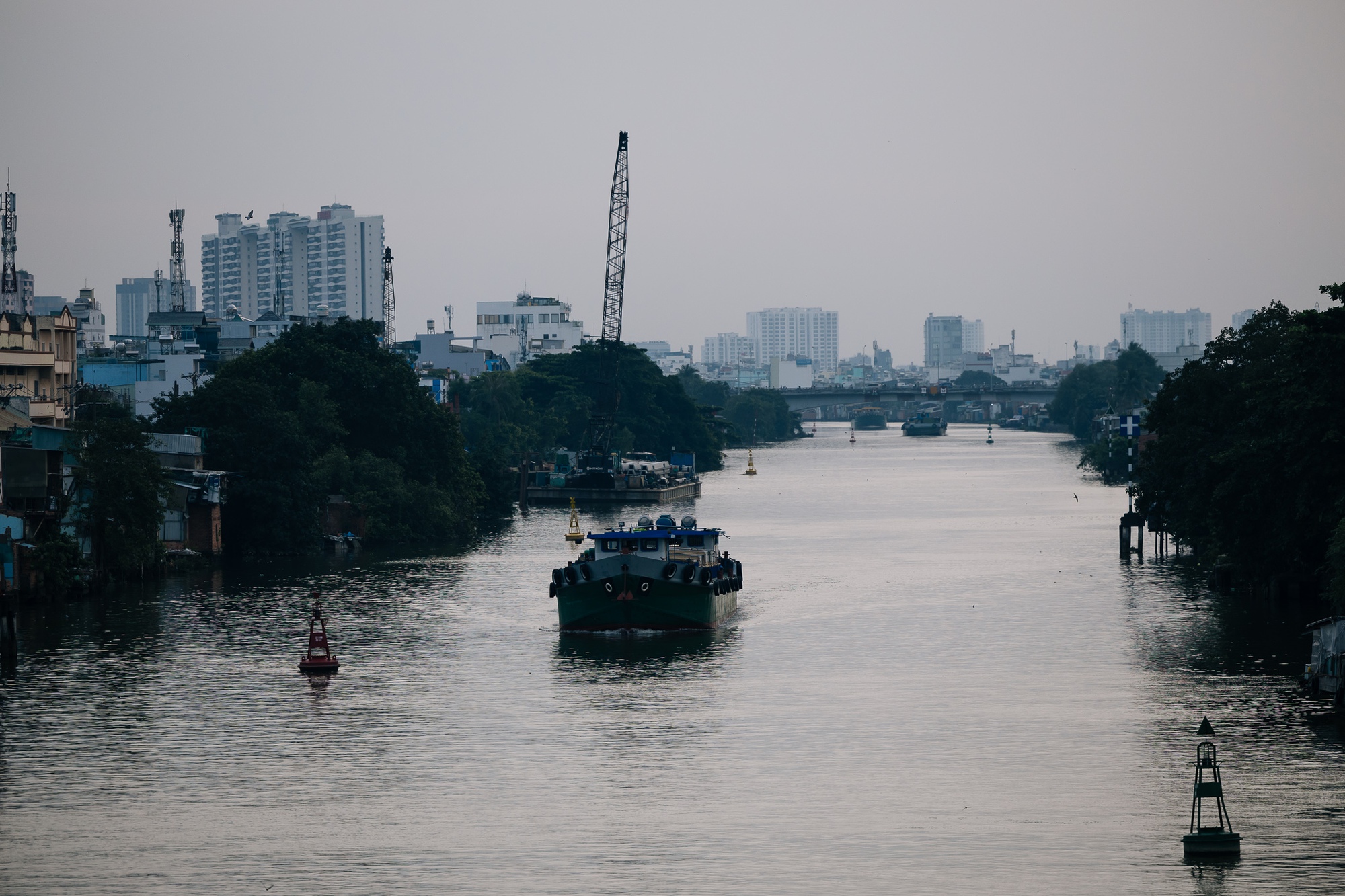 Chùm ảnh: TP.HCM trong ngày rét 19 độ C hiếm thấy- Ảnh 17. Chùm ảnh: TP.HCM trong ngày rét 19 độ C hiếm thấy- Ảnh 17.