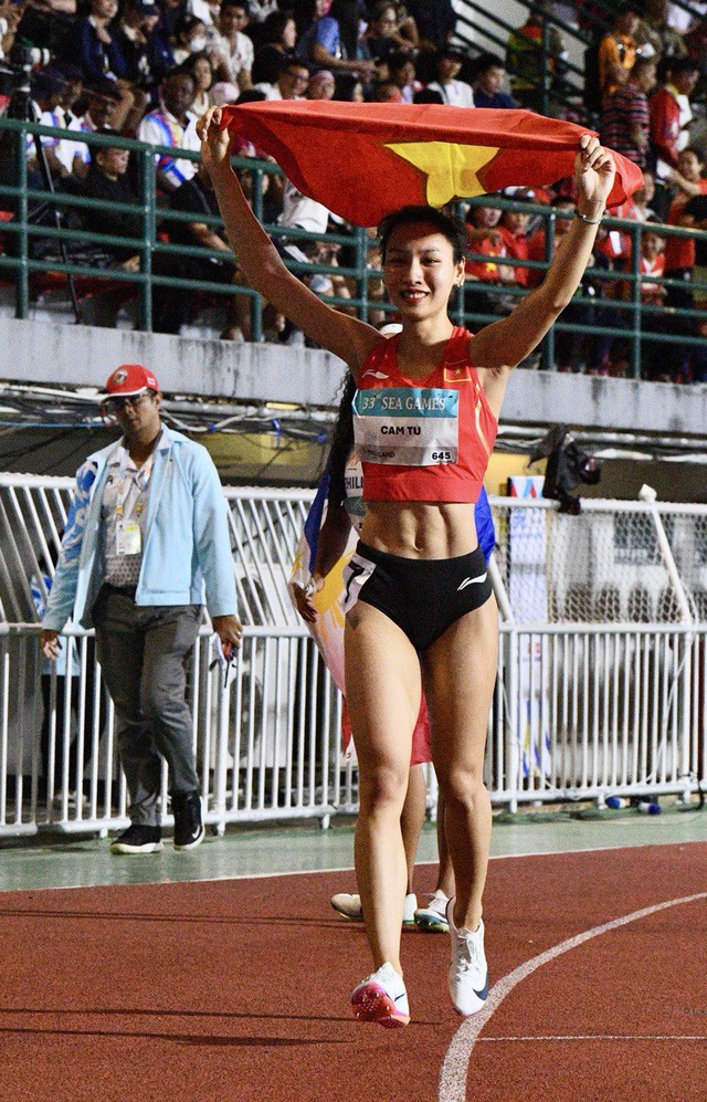 Tìm ra "nữ thần điền kinh" Việt Nam tại SEA Games: Tài năng có thừa, bụng 6 múi săn chắc, chân còn dài thẳng thắp- Ảnh 1.