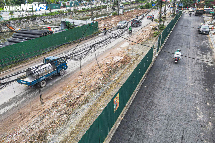 Hà Nội: Dân ngán ngẩm đường Tam Trinh làm 10 năm chưa xong, nay lại thêm bãi rác khổng lồ- Ảnh 1.