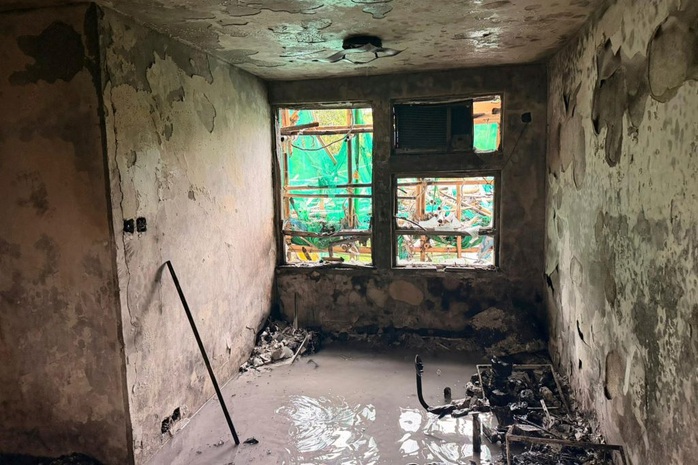 Cháy chung cư Hồng Kông: Thi thể hóa tro bụi, căn hộ cháy đen - Ảnh 1. Cháy chung cư Hồng Kông: Thi thể hóa tro bụi, căn hộ cháy đen - Ảnh 1.