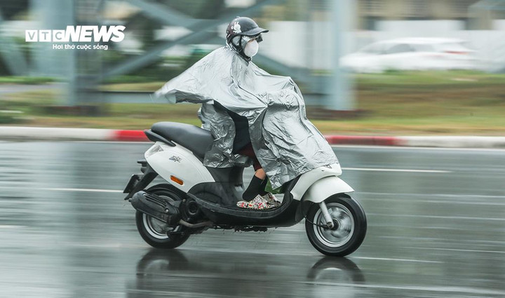 Sáng mai không khí lạnh tràn về miền Bắc, trời mưa rải rác- Ảnh 1.