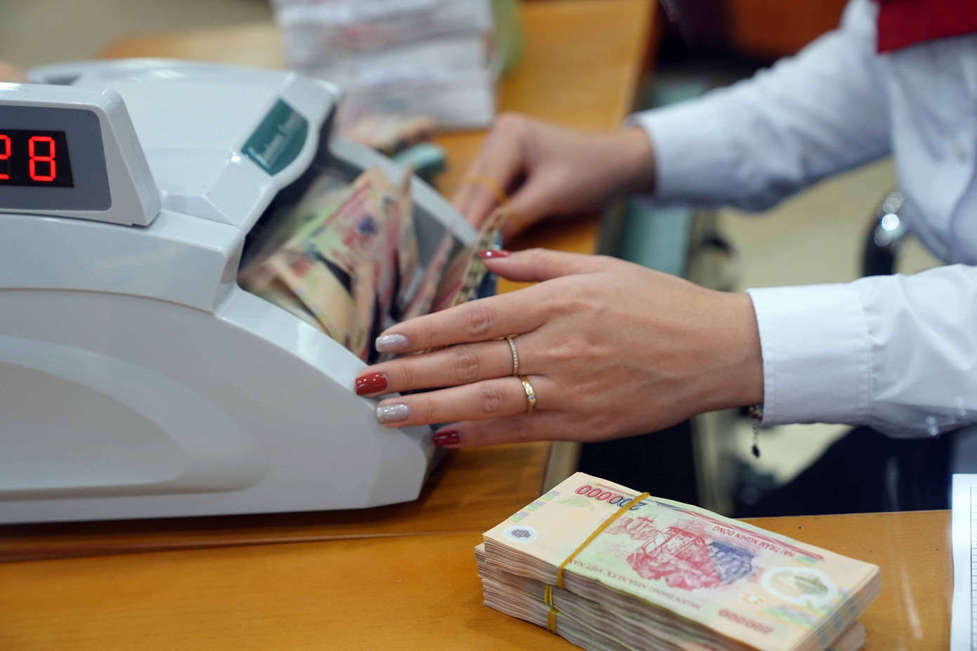 Vì sao lãi suất huy động tăng mạnh cuối năm?- Ảnh 1.