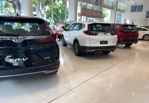 Đề xuất giảm lệ phí đăng ký ô tô: Chưa đủ kích sức mua - Ảnh 1.