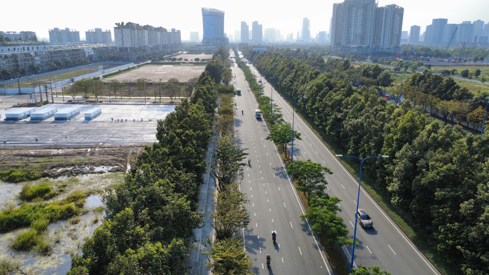 Làn xe đạp trên đường Mai Chí Thọ hoàn thành, xe máy cần tránh nếu không muốn bị phạt - Ảnh 10.
