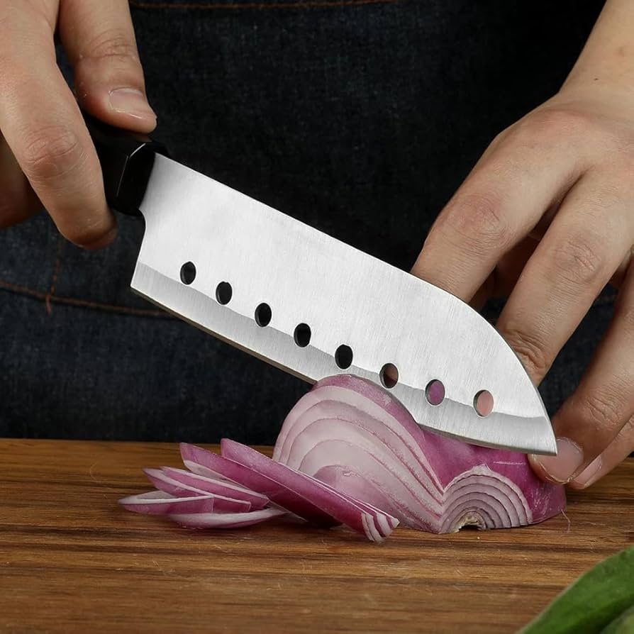 Hỏi 10 người thì 9 người không biết hết công dụng thật sự của lỗ nhỏ trên con dao- Ảnh 2. Hỏi 10 người thì 9 người không biết hết công dụng thật sự của lỗ nhỏ trên con dao- Ảnh 2.